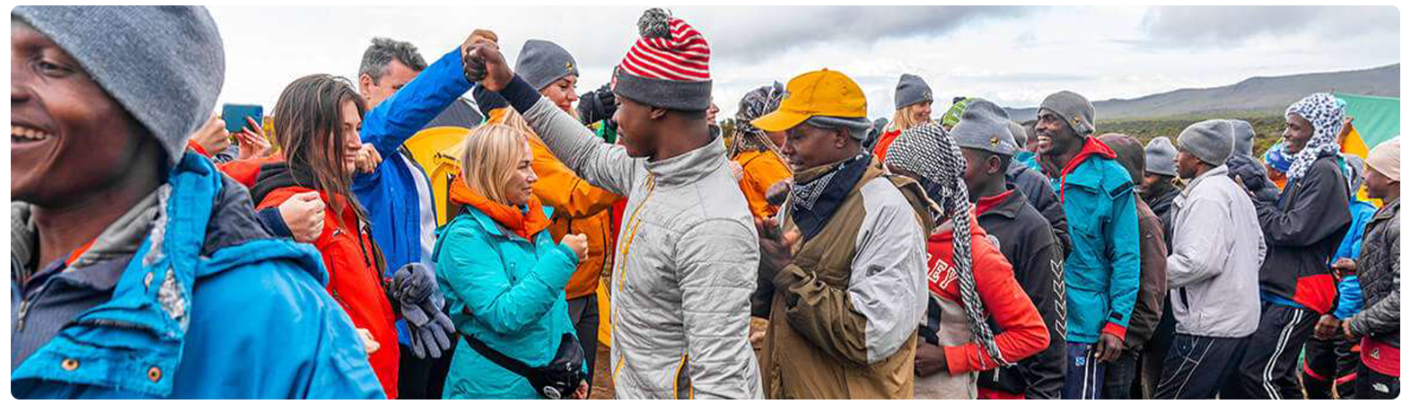 Group tipping ceremony after descent
