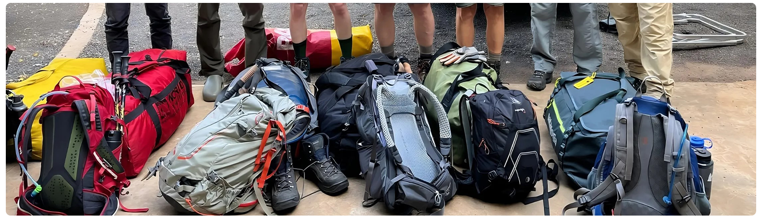 Hiker checking equipment list or packing gear